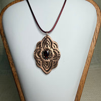 Alhambra Pendant · Troy Bronze, Garnet & CZ Stones